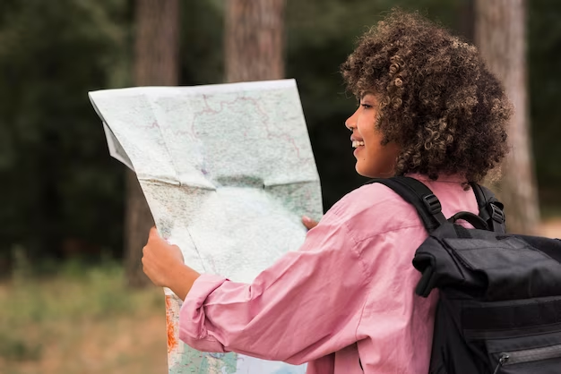 Female hiking with a map