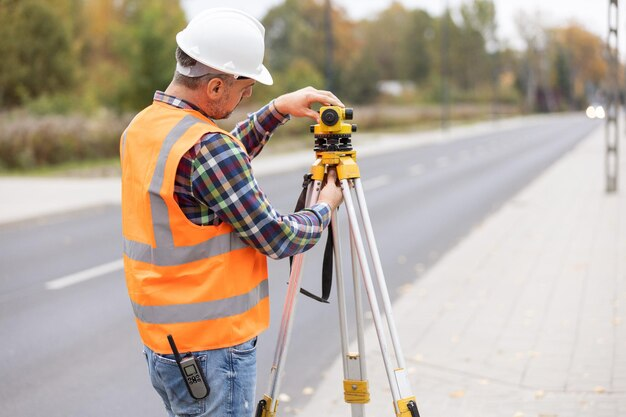 engineer using laser scanner