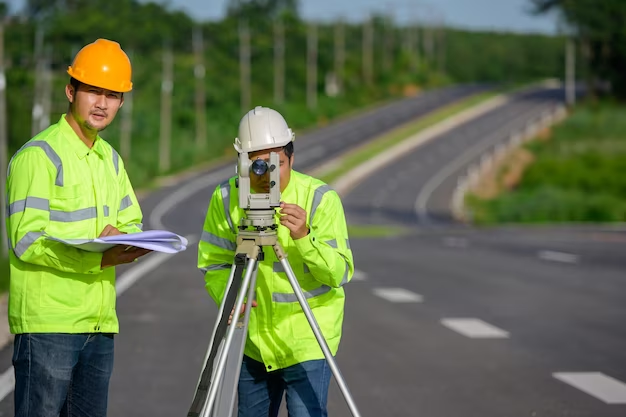 engineers using laser scanner