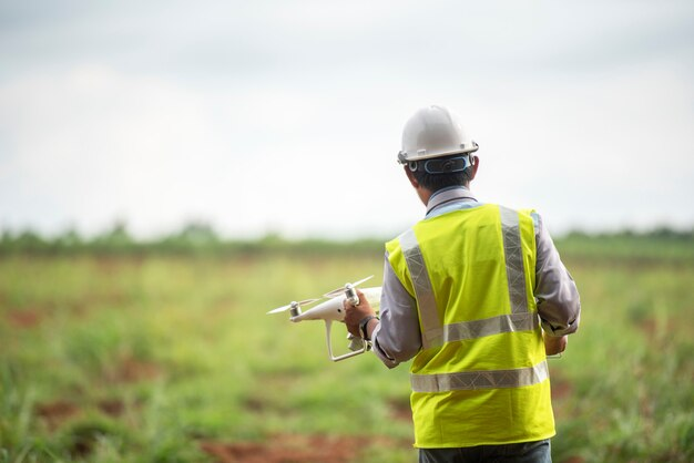 Land surveyor with a drone